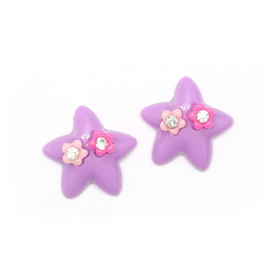 Violette Sterne mit Blumen und Strasssteinen