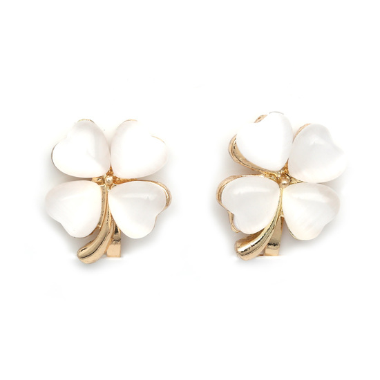 White simulated cat eye four leaf clover gold-tone clip on earrings